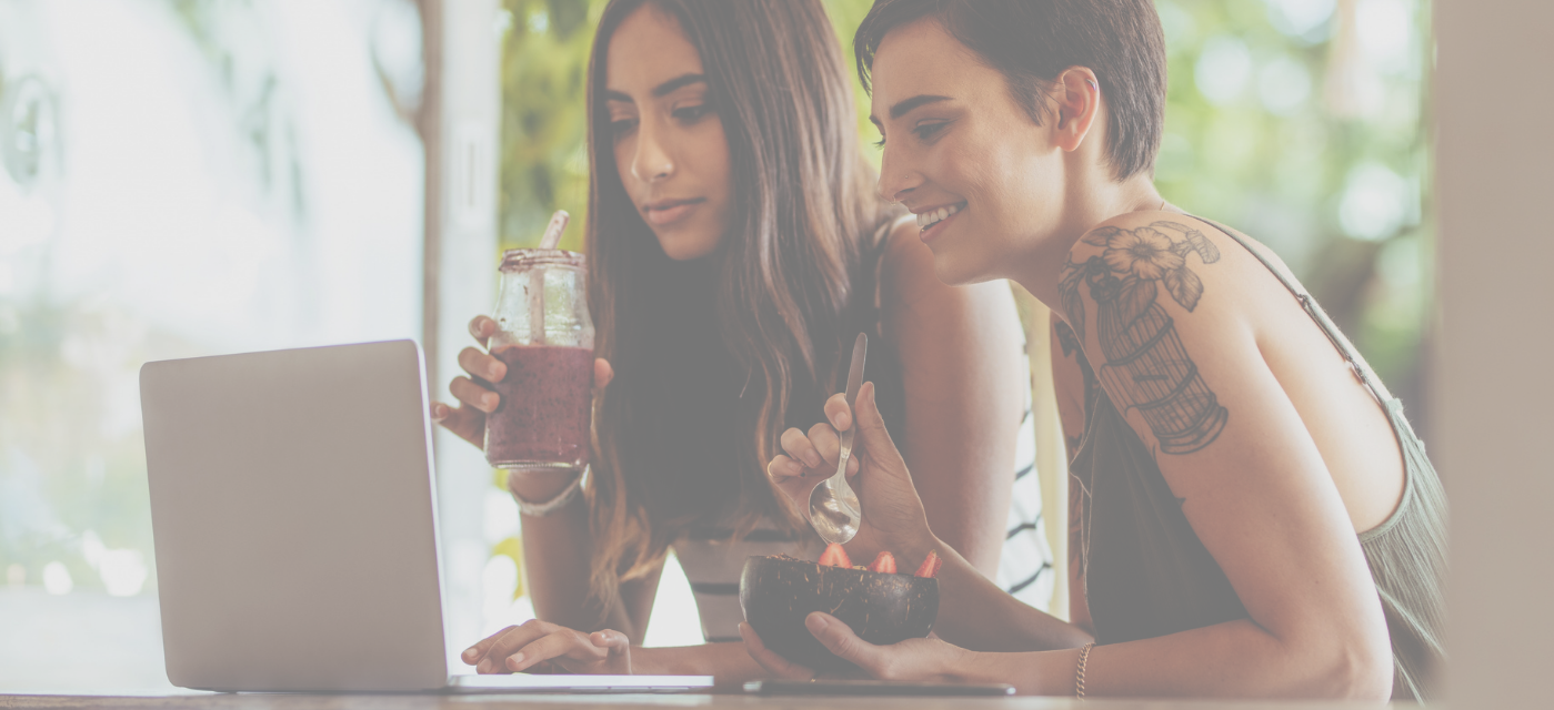 Two women enjoy plant protein shakes